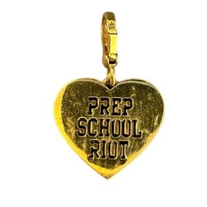 Gold-tone Juicy Couture "Prep School Riot" crest charm